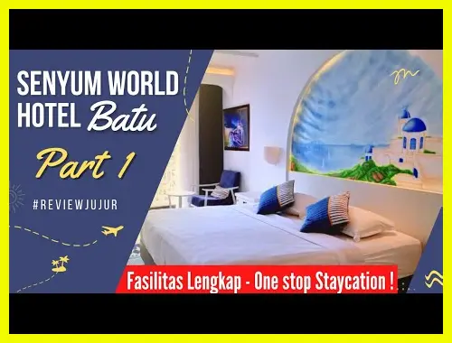 Sudut balkon kamar Senyum World Hotel dengan latar belakang bianglala Jatim Park 3 saat lampu mulai menyala di sore hari.